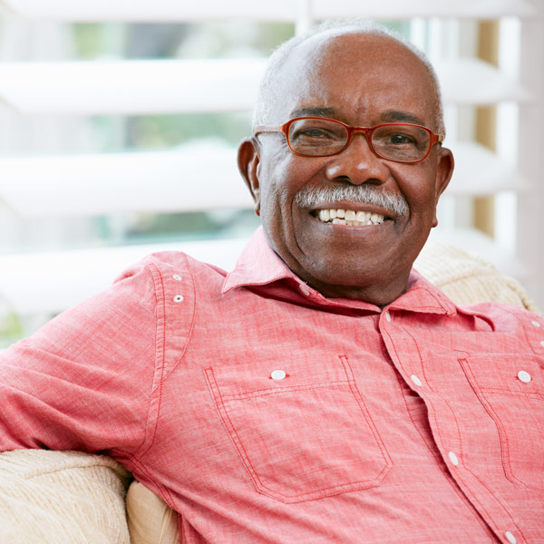 man with glasses smiling