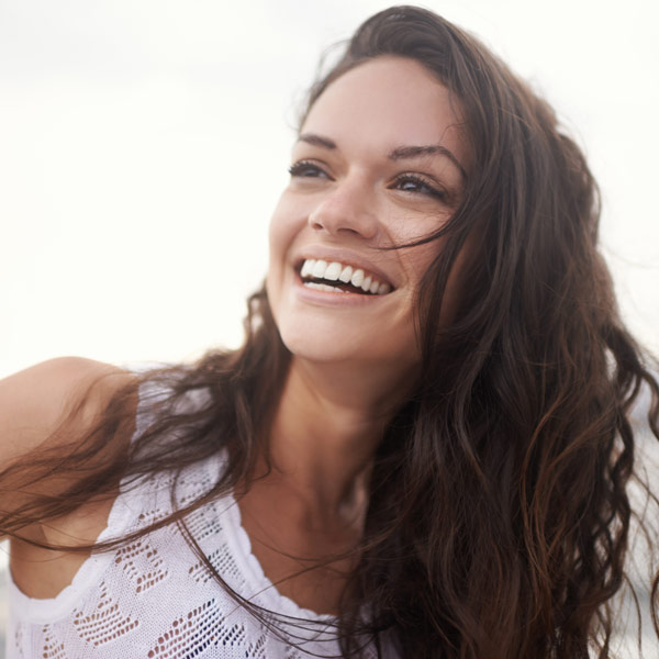A Smiling Woman Embodies the Friendly Dental Care Experience in Santa Barbara, CA