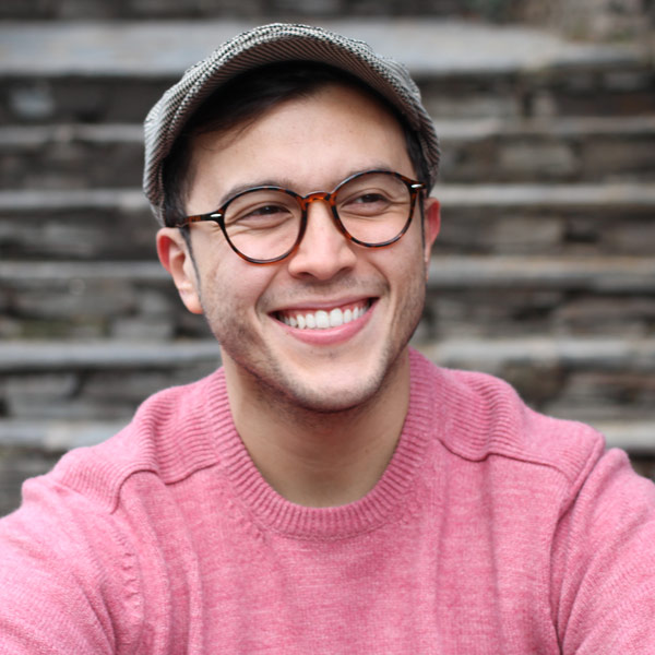 man in glasses smiling